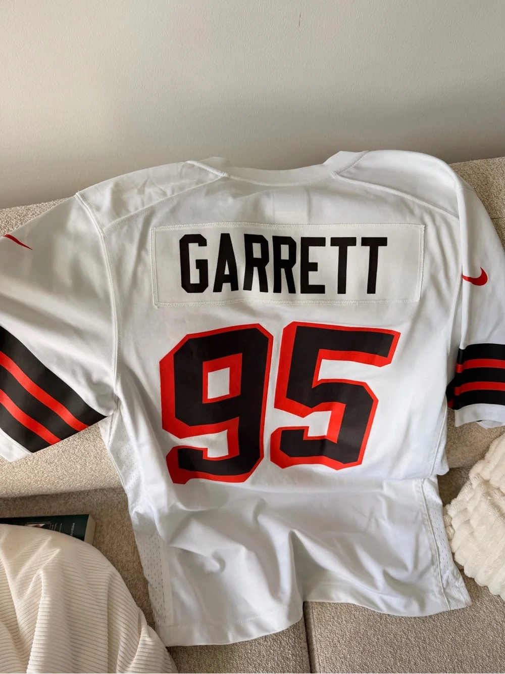 Nike Men’s White NFL #95 Jersey with Black and Red Accents